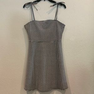 Gingham black and white women’s dress.